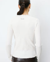 Pull ajusté en maille fine col montant ivoire Alino