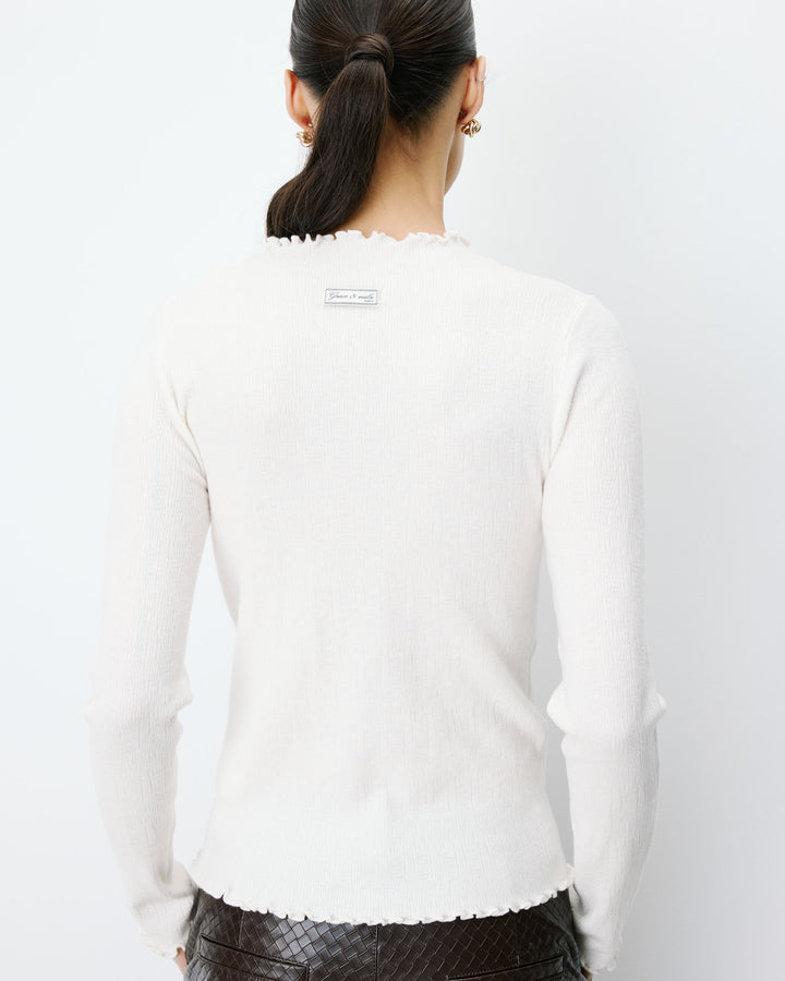 Pull ajusté en maille fine col montant ivoire Alino