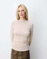 Long-sleeve asymmetric draped top sable Aurygny