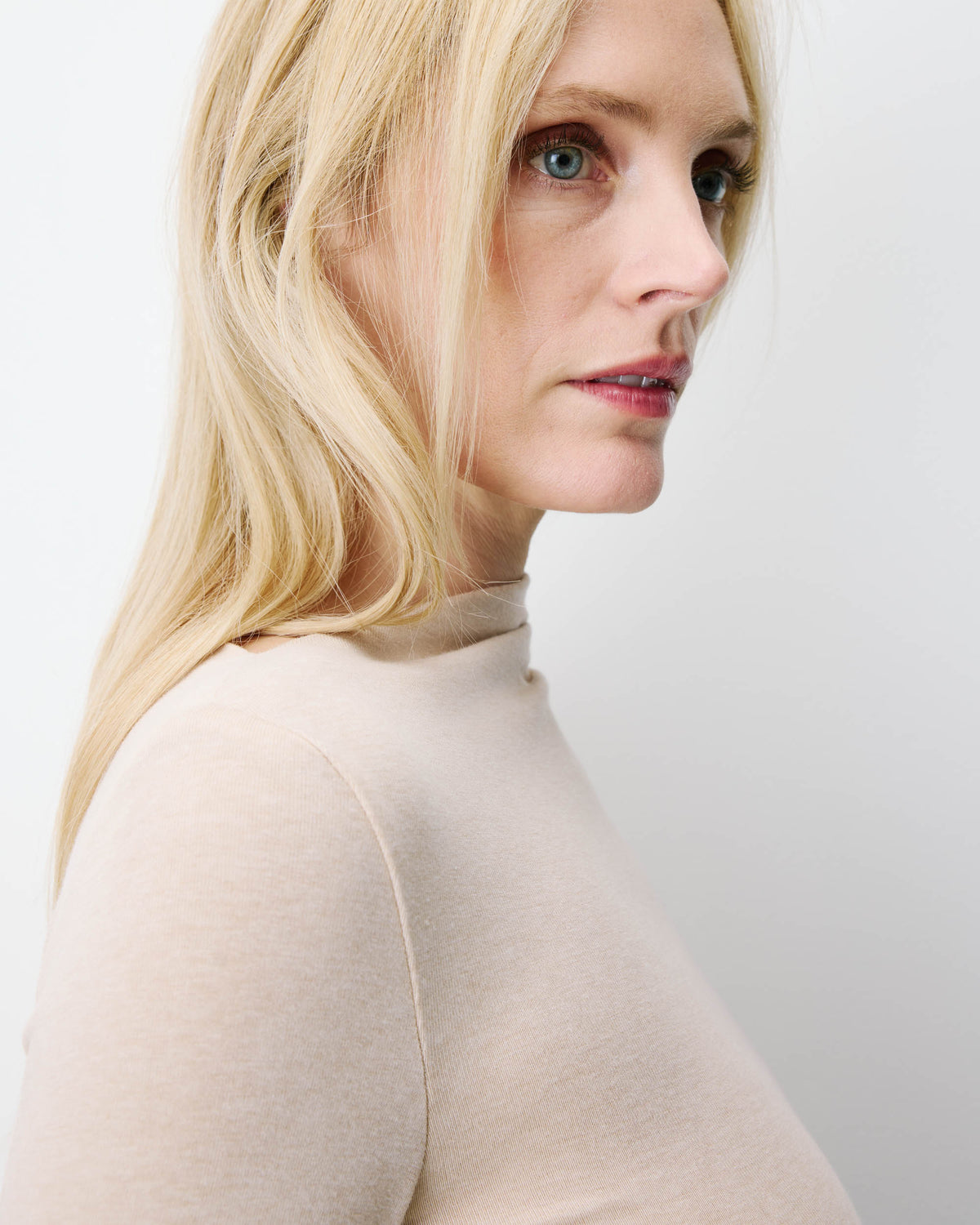 Long-sleeve asymmetric draped top sable Aurygny