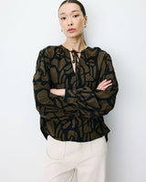 Geometric-print V-neck blouse kaki Ambrine