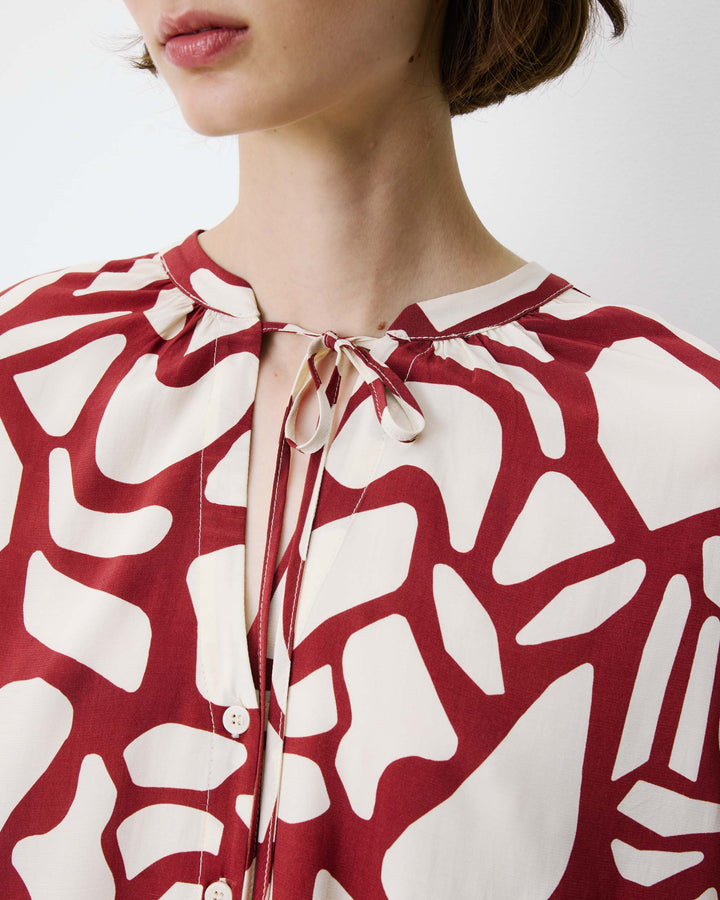 Geometric-print V-neck blouse terracotta Ambrine