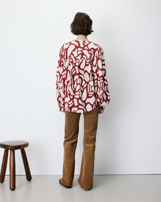Blouse col V à imprimé géométrique terracotta Ambrine
